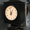 Pedestal post clock being tested before shipping.