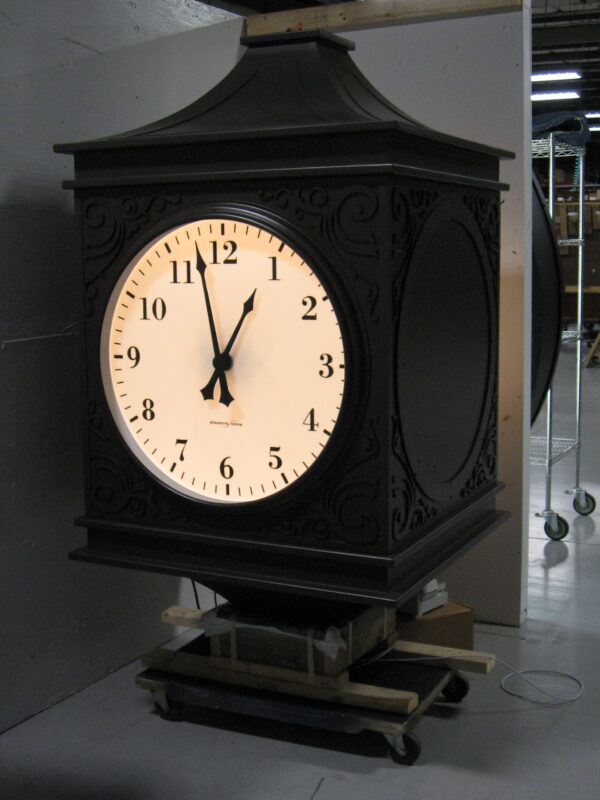 Pedestal post clock being tested before shipping.