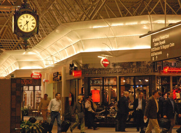 Milwaukee Airport post clock hanging indoors