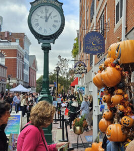 Almy’s Clock on Essex Street during Salem’s bustling fall event.